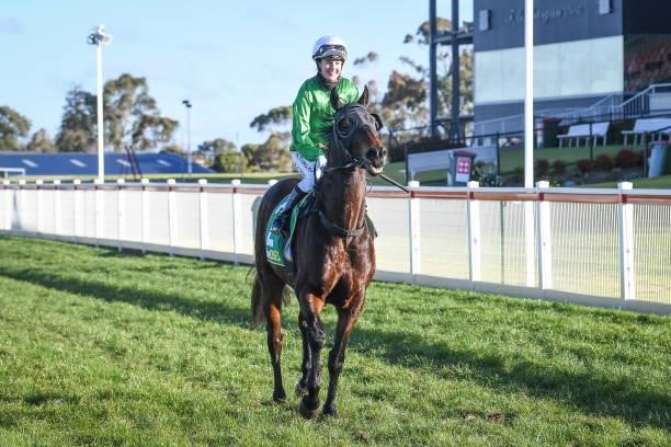 Tayla Childs returns to the mounting yard on Imperial Lad after winning the The Jai Roderick Memorial Race BM70 Handicap, at Geelong Racecourse on...