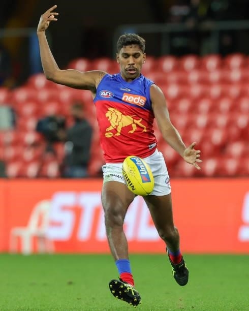 Keidean Coleman kicks the ball during the 2021 AFL Round 18 match between the Richmond Tigers and the Brisbane Lions at Metricon Stadium on July 16,...