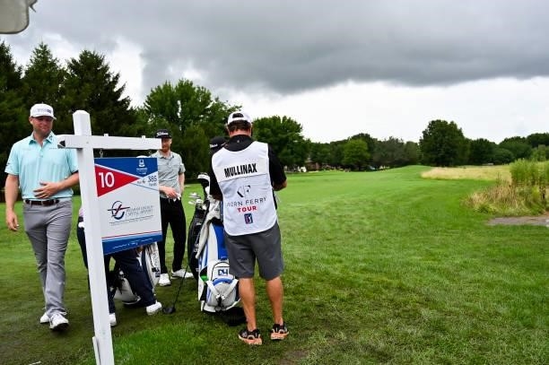 Caddies and players get ready to tee off in the afternoon at the 10th tee during the second round of the Memorial Health Championship presented by...