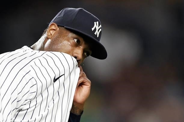 Aroldis Chapman of the New York Yankees reacts during the ninth inning against the Boston Red Sox at Yankee Stadium on July 16, 2021 in the Bronx...