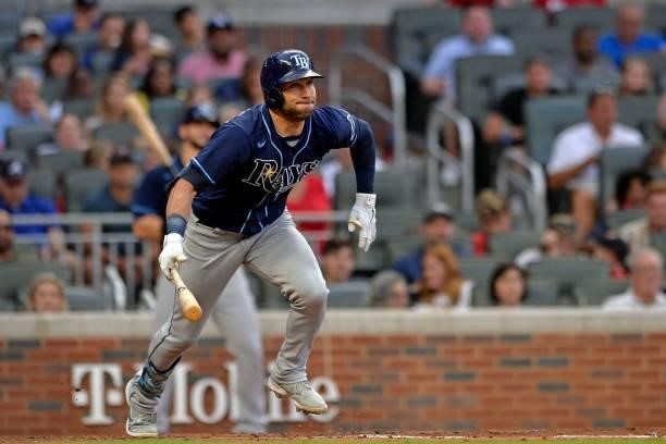 Kevin Kiermaier of the Tampa Bay Rays runs to first base in the fourth inning against the Atlanta Braves at Truist Park on July 16, 2021 in Atlanta,...