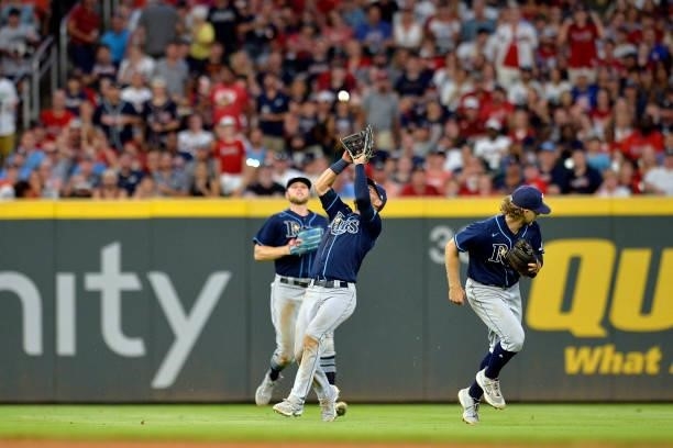 Kevin Kiermaier of the Tampa Bay Rays fields a fly ball to end the fifth inning against the Atlanta Braves at Truist Park on July 16, 2021 in...