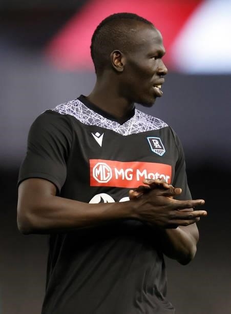 Aliir Aliir of the Power warms up during the 2021 AFL Round 18 match between the St Kilda Saints and the Port Adelaide Power at Marvel Stadium on...