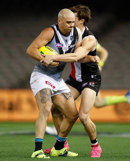 Sam Powell-Pepper of the Power is tackled by Jack Steele of the Saints during the 2021 AFL Round 18 match between the St Kilda Saints and the Port...