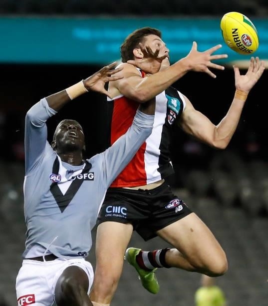 Aliir Aliir of the Power and Rowan Marshall of the Saints compete for the ball during the 2021 AFL Round 18 match between the St Kilda Saints and the...