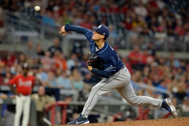 Matt Wisler of the Tampa Bay Rays pitches in the eighth inning against the Atlanta Braves at Truist Park on July 16, 2021 in Atlanta, Georgia.