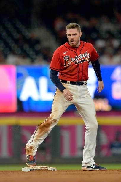 Freddie Freeman of the Atlanta Braves looks back after stealing second base in the ninth inning against the Tampa Bay Rays at Truist Park on July 16,...
