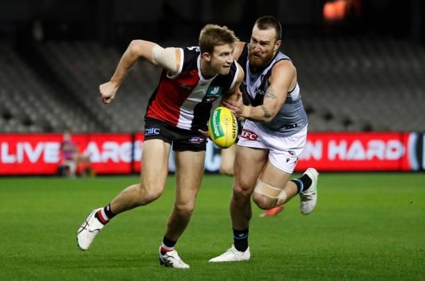Dougal Howard of the Saints and Charlie Dixon of the Power compete for the ball during the 2021 AFL Round 18 match between the St Kilda Saints and...