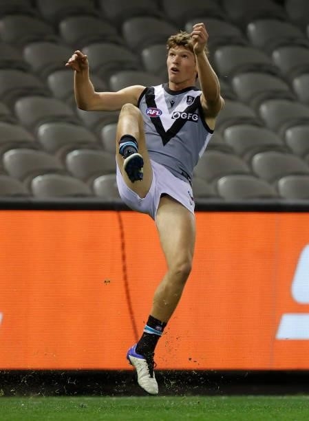 Mitch Georgiades of the Power kicks the ball during the 2021 AFL Round 18 match between the St Kilda Saints and the Port Adelaide Power at Marvel...