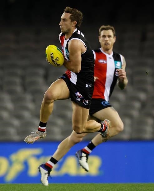 Luke Dunstan of the Saints marks the ball during the 2021 AFL Round 18 match between the St Kilda Saints and the Port Adelaide Power at Marvel...