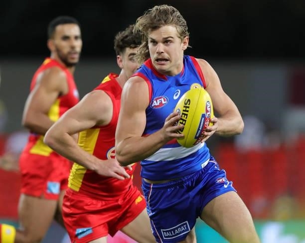 Bailey Smith of the Bulldogs looks for options during the 2021 AFL Round 18 match between the Gold Coast Suns and the Western Bulldogs at Metricon...