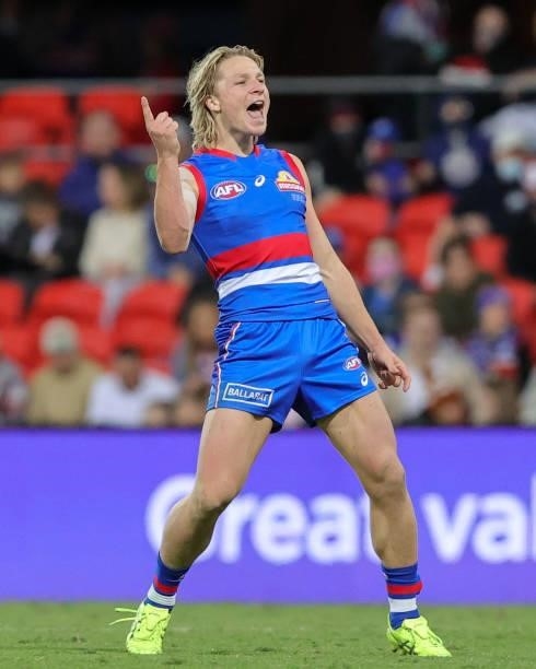 Cody Weightman of the Bulldogs celebrates a goal during the 2021 AFL Round 18 match between the Gold Coast Suns and the Western Bulldogs at Metricon...