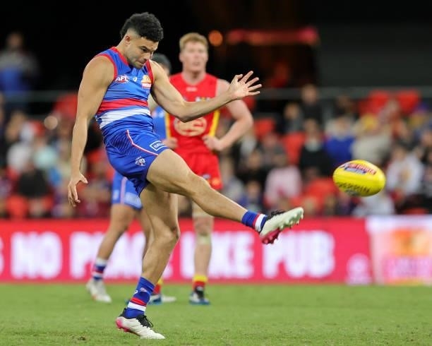 Jason Johannisen of the Bulldogs kicks at goal during the 2021 AFL Round 18 match between the Gold Coast Suns and the Western Bulldogs at Metricon...