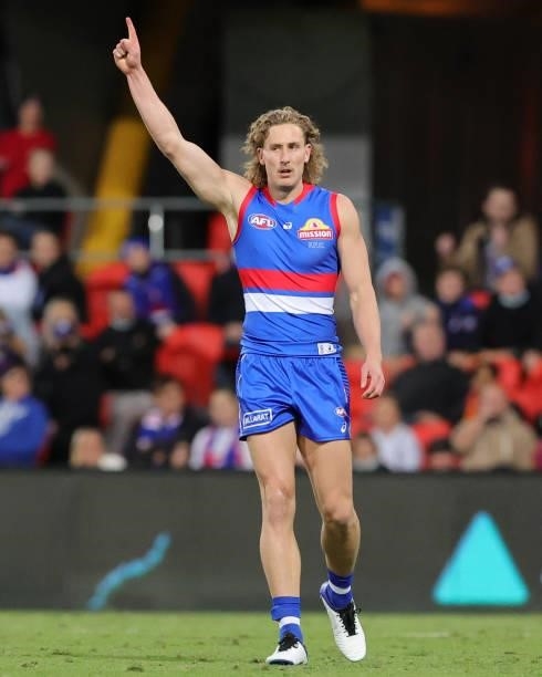 Aaron Naughton of the Bulldogs celebrates a goal during the 2021 AFL Round 18 match between the Gold Coast Suns and the Western Bulldogs at Metricon...