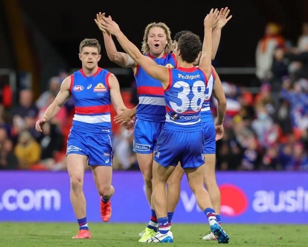Cody Weightman of the Bulldogs celebrates a goal during the 2021 AFL Round 18 match between the Gold Coast Suns and the Western Bulldogs at Metricon...