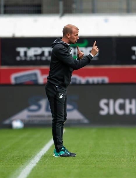 Coach Sebastian Hoeness of Hoffenheim reacts during the Bundesliga Pre-Season Match between 1. FC Heidenheim 1846 and TSG Hoffenheim at Voith-Arena...