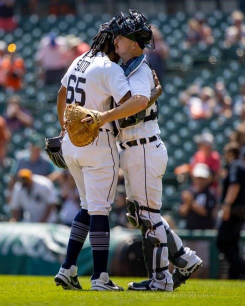 Relief pitcher Gregory Soto of the Detroit Tigers gets a hug from teammate Jake Rogers after game one of a double header against the Minnesota Twins...