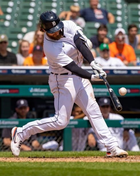 Eric Haase of the Detroit Tigers swings and makes contact in the fourth inning against the Minnesota Twins during game one of a double header at...