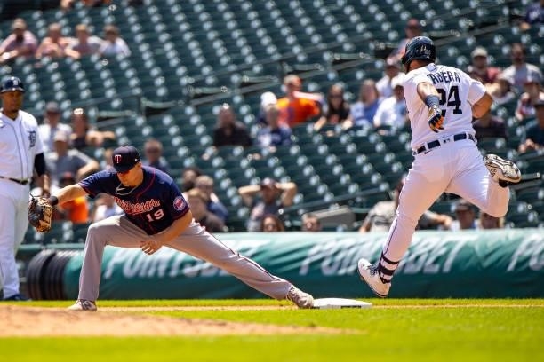 Alex Kirilloff of the Minnesota catches the ball at first base as Miguel Cabrera of the Detroit Tigers grounds out in the sixth inning Twins during...