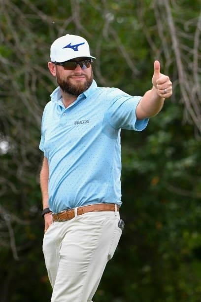 Erik Barnes gives a thumbs up to his son on the first tee during the third round of the Memorial Health Championship presented by LRS at Panther...