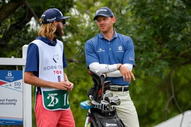 Jared Wolfe talks with his caddie on the first tee during the third round of the Memorial Health Championship presented by LRS at Panther Creek...