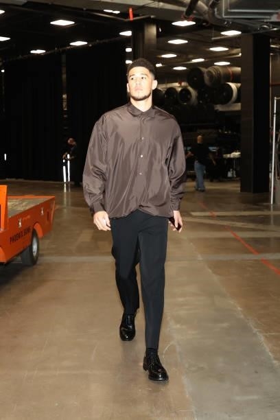 July 17: Devin Booker of the Phoenix Suns arrives to the arena prior to the game against the Milwaukee Bucks during Game Five of the 2021 NBA Finals...