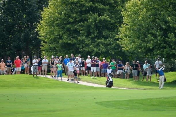 Jared Wolfe hits his shot from just off the fairway at the 18th hole during the third round of the Memorial Health Championship presented by LRS at...