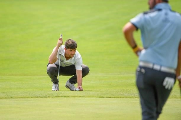 Ollie Schniederjans lines up a putt at the 18th green during the third round of the Memorial Health Championship presented by LRS at Panther Creek...