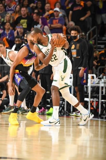 Khris Middleton of the Milwaukee Bucks handles the ball during the game against the Phoenix Suns during Game Five of the 2021 NBA Finals on July 17,...