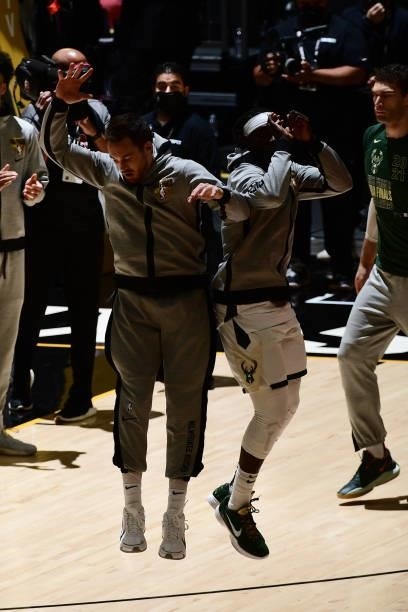 July 17: Pat Connaughton and Jrue Holiday of the Milwaukee Bucks embrace before Game Five of the 2021 NBA Finals on July 17, 2021 at Footprint Center...
