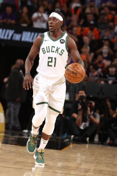 July 17: Jrue Holiday of the Milwaukee Bucks dribbles the ball against the Phoenix Suns during Game Five of the 2021 NBA Finals on July 17, 2021 at...