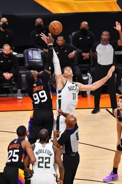 Jump-ball between Jae Crowder of the Phoenix Suns and Brook Lopez of the Milwaukee Bucks during Game Five of the 2021 NBA Finals on July 17, 2021 at...