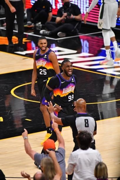 Mikal Bridges of the Phoenix Suns and Jae Crowder of the Phoenix Suns react during Game Five of the 2021 NBA Finals on July 17, 2021 at Footprint...
