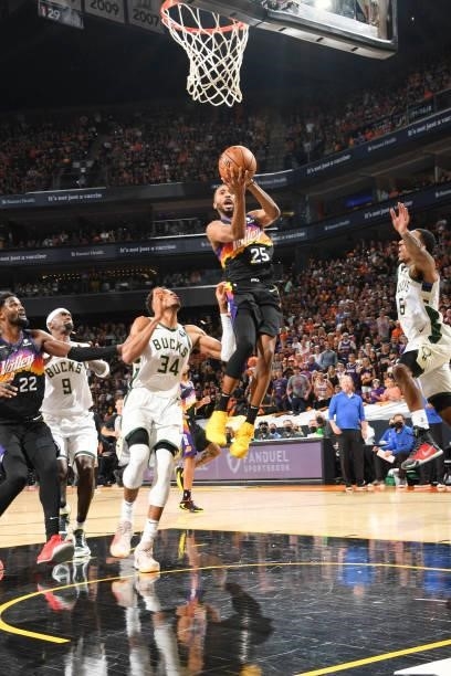 Mikal Bridges of the Phoenix Suns drives to the basket during the game against the Milwaukee Bucks during Game Five of the 2021 NBA Finals on July...