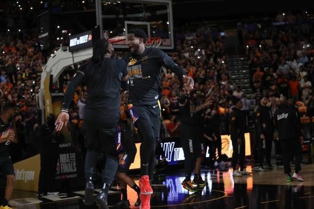 July 17: Deandre Ayton of the Phoenix Suns high fives Jae Crowder of the Phoenix Suns prior to the game against the Milwaukee Bucks during Game Five...