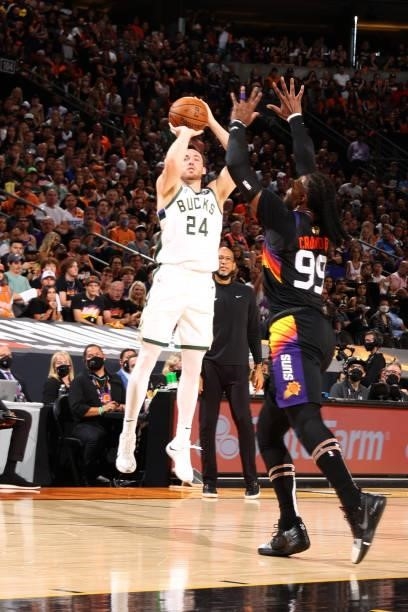 July 17: Pat Connaughton of the Milwaukee Bucks shoots a three point basket against the Phoenix Suns during Game Five of the 2021 NBA Finals on July...