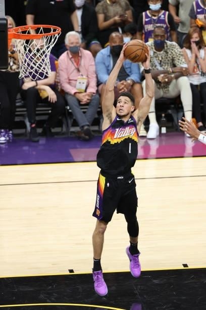 July 17: Devin Booker of the Phoenix Suns shoots the ball during the game against the Milwaukee Bucks during Game Five of the 2021 NBA Finals on July...