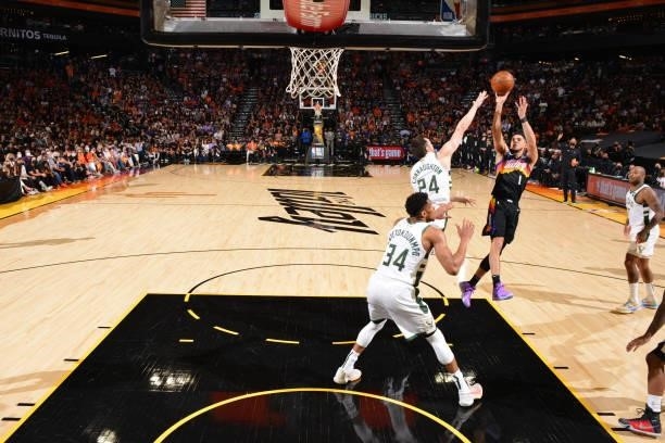 Devin Booker of the Phoenix Suns shoots the ball against the Milwaukee Bucks during Game Five of the 2021 NBA Finals on July 17, 2021 at Footprint...
