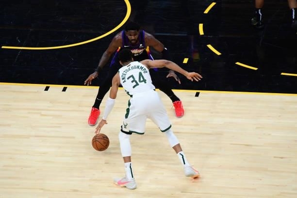 July 17: Deandre Ayton of the Phoenix Suns plays defense on Giannis Antetokounmpo of the Milwaukee Bucks during Game Five of the 2021 NBA Finals on...