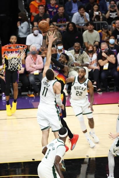 July 17: Deandre Ayton of the Phoenix Suns shoots the ball during the game against the Milwaukee Bucks during Game Five of the 2021 NBA Finals on...