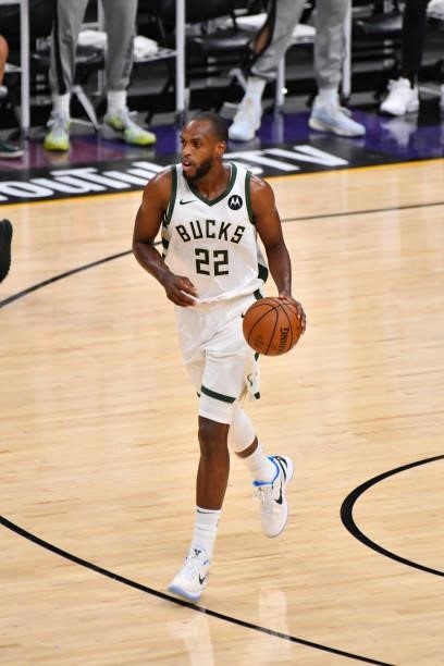 Khris Middleton of the Milwaukee Bucks handles the ball against the Phoenix Suns during Game Five of the 2021 NBA Finals on July 17, 2021 at...