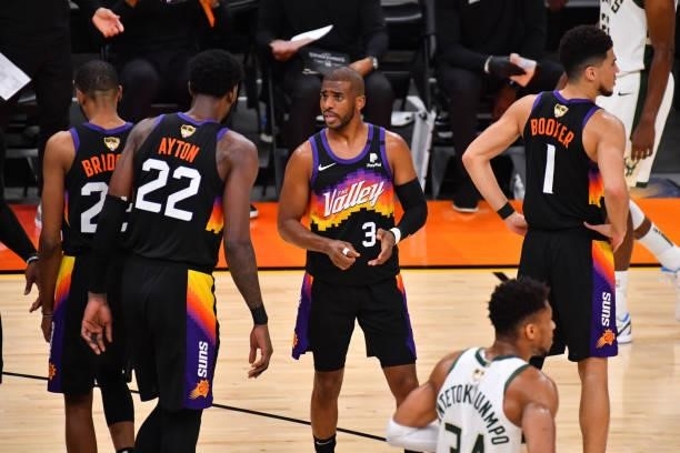 Deandre Ayton of the Phoenix Suns and Chris Paul of the Phoenix Suns talk during Game Five of the 2021 NBA Finals on July 17, 2021 at Footprint...