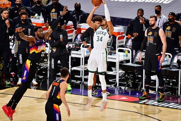 Giannis Antetokounmpo of the Milwaukee Bucks shoots the ball against the Phoenix Suns during Game Five of the NBA Finals on July 17, 2021 at...