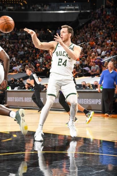Pat Connaughton of the Milwaukee Bucks passes the ball during the game against the Phoenix Suns during Game Five of the 2021 NBA Finals on July 17,...