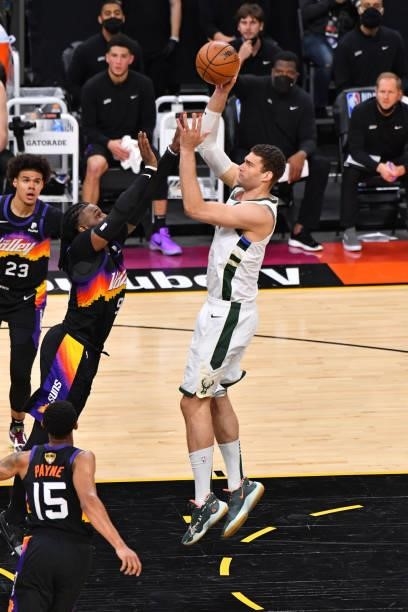 Brook Lopez of the Milwaukee Bucks shoots the ball against the Phoenix Suns during Game Five of the 2021 NBA Finals on July 17, 2021 at Footprint...