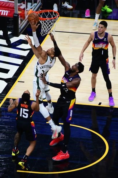 July 17: Giannis Antetokounmpo of the Milwaukee Bucks drives to the basket against the Phoenix Suns during Game Five of the 2021 NBA Finals on July...