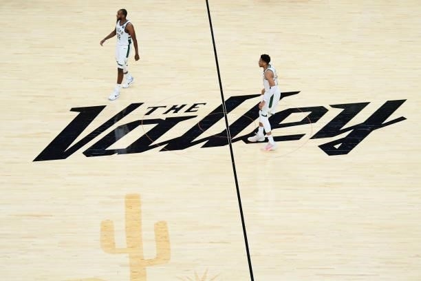 July 17: Khris Middleton and Giannis Antetokounmpo of the Milwaukee Bucks look on during Game Five of the 2021 NBA Finals on July 17, 2021 at...