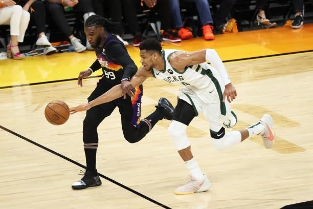 July 17: Giannis Antetokounmpo of the Milwaukee Bucks reaches for the ball during the game against the Phoenix Suns during Game Five of the 2021 NBA...