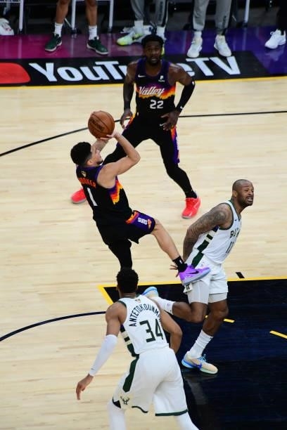 July 17: Devin Booker of the Phoenix Suns shoots the ball against the Milwaukee Bucks during Game Five of the 2021 NBA Finals on July 17, 2021 at...