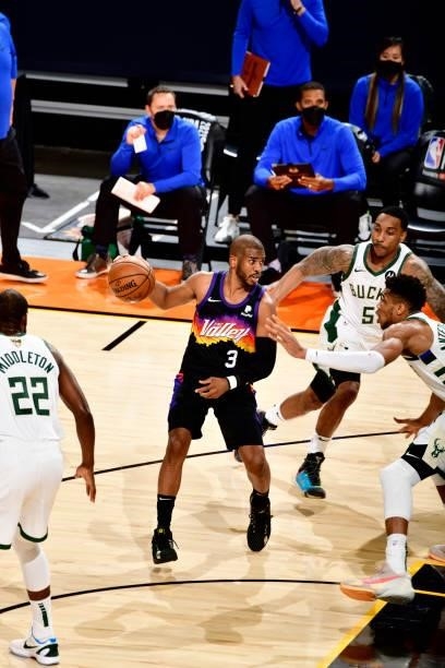 Chris Paul of the Phoenix Suns dribble during the game against the Milwaukee Bucks on July 17, 2021 during Game Five of the NBA Finals at Footprint...